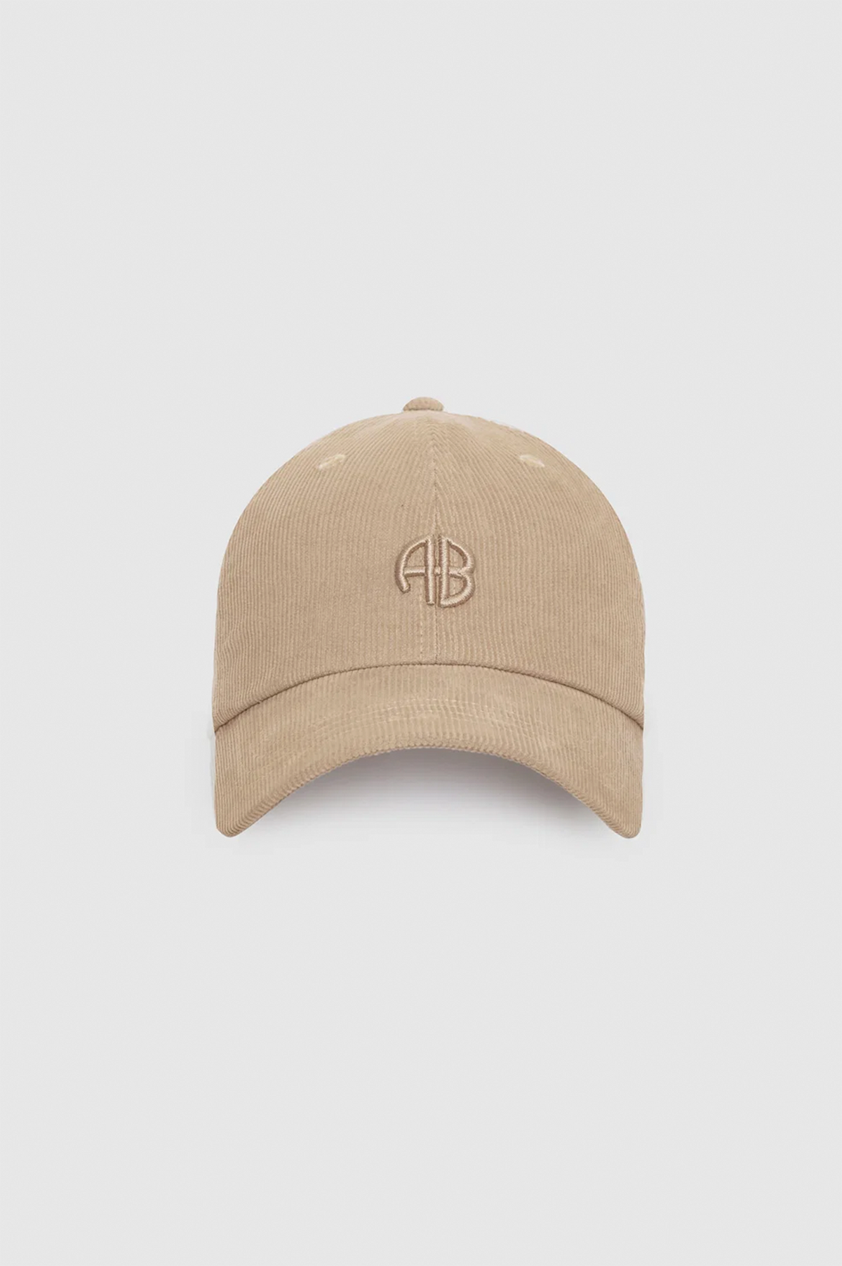 A beige corduroy baseball cap with an embroidered circular 'AB' logo on the front, displayed against a light gray background.