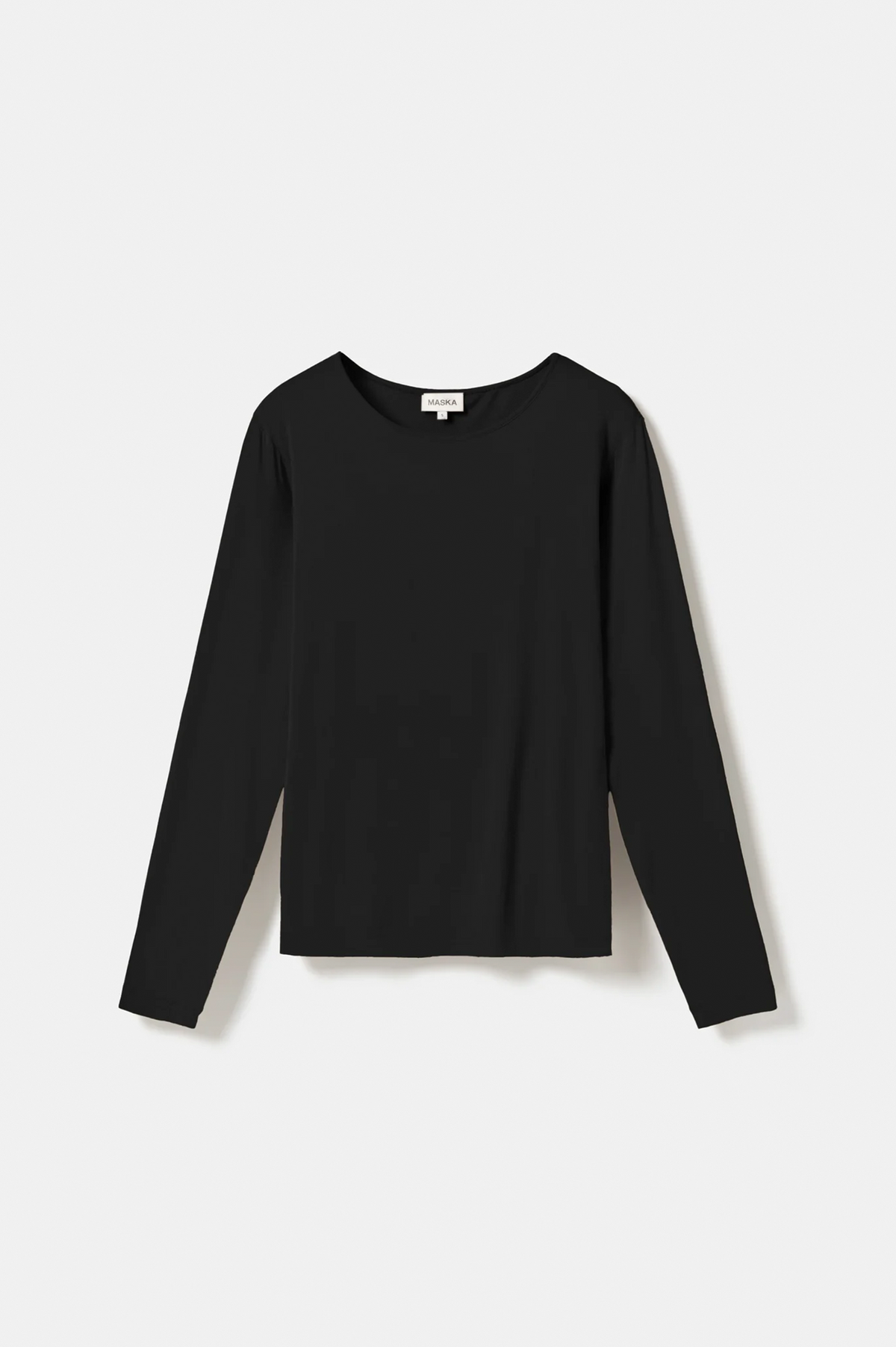 A plain black long-sleeve crewneck top laid flat against a light gray background.