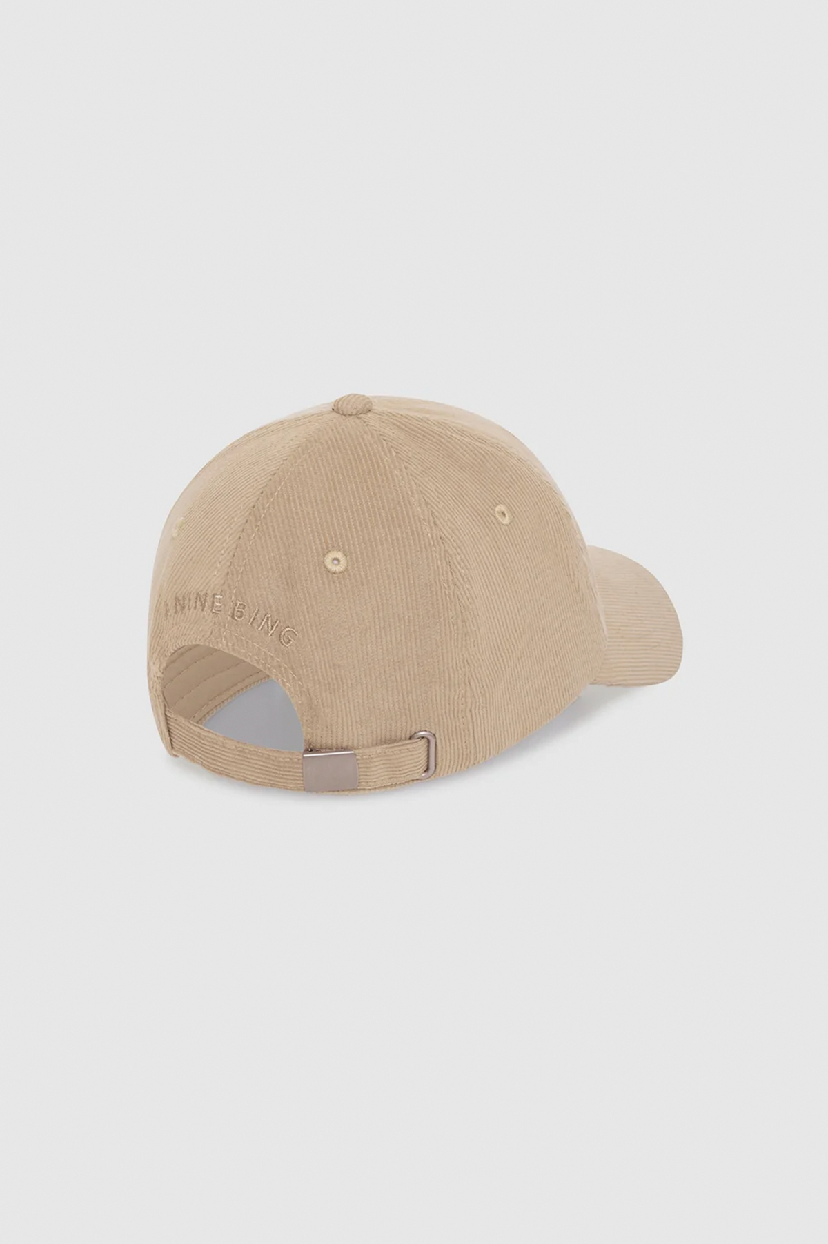 A beige baseball cap shown from the back on a light gray background, featuring an adjustable strap and subtle embroidered branding.