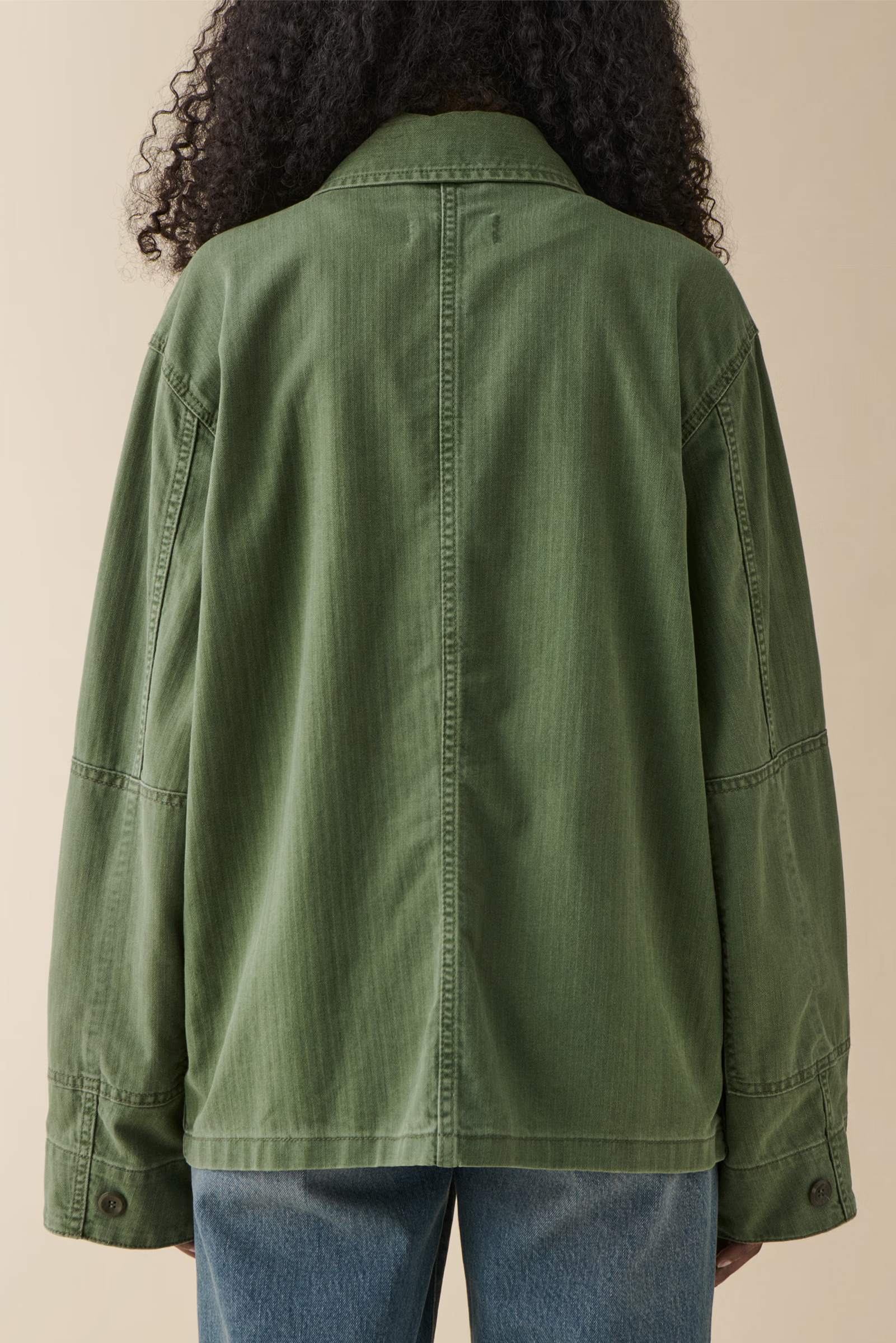 lucy jacket in chevron green from jeanerica on model