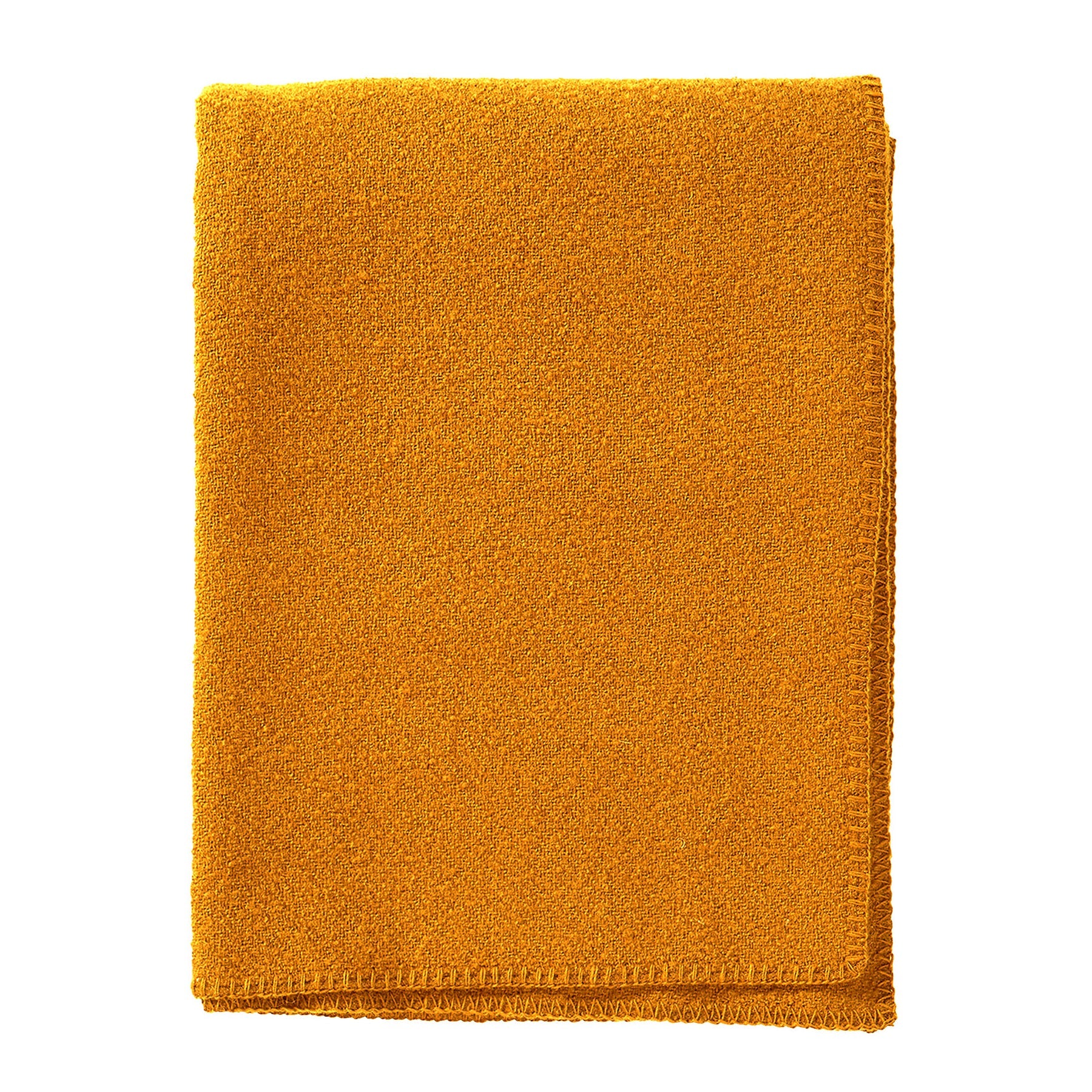 Boucle throw from Klippan in Ochre