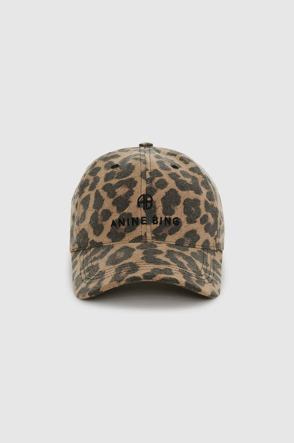 Leopard print cap from Anine Bing with black text on a white background
