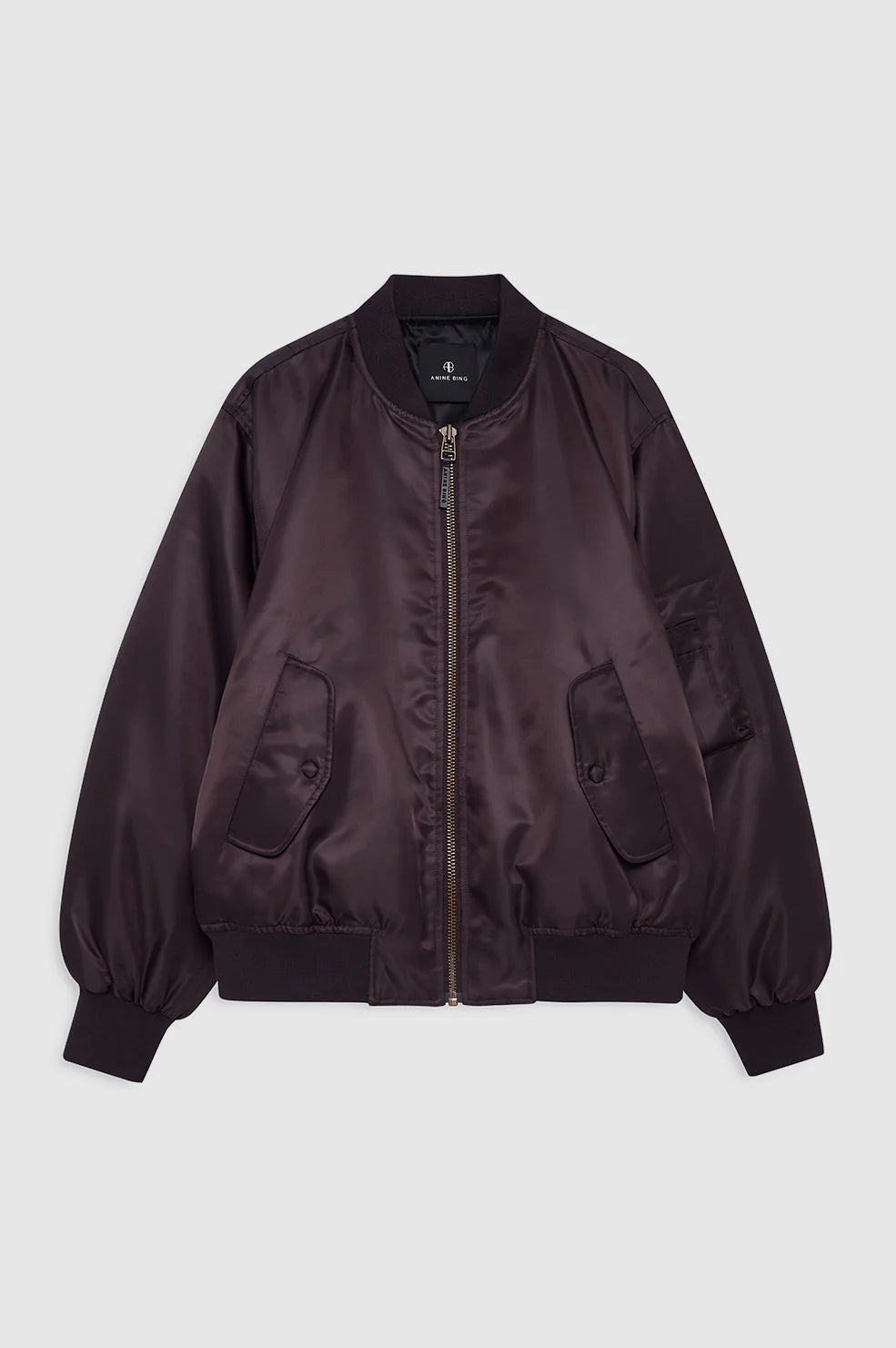 Dark brown bomber jacket on a light gray background