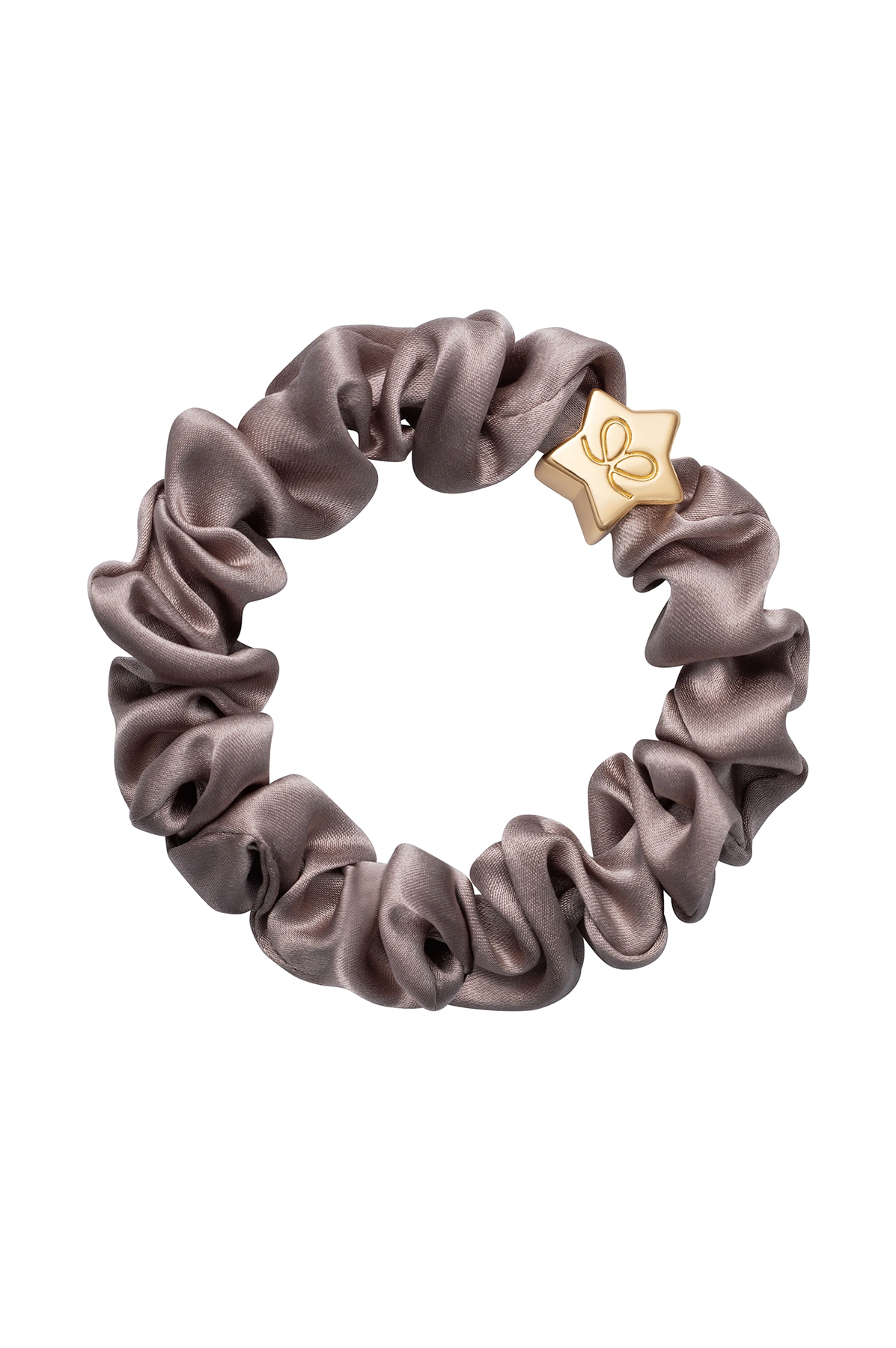 Gray scrunchie with a gold star-shaped clip on a white background