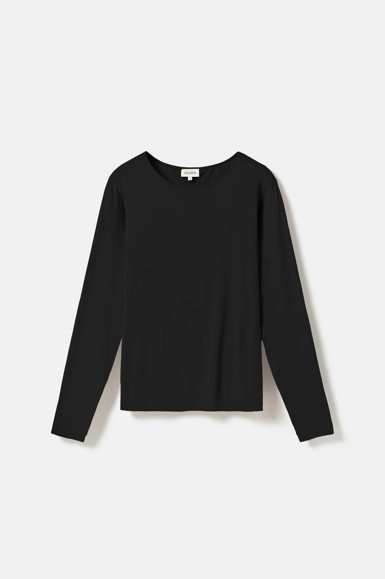 A plain black long-sleeve crewneck top laid flat against a light gray background.