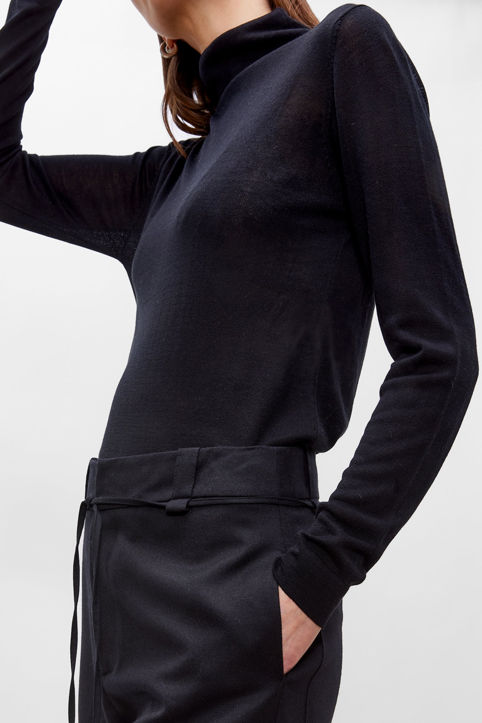 Black long-sleeve cashmere top and pants on a white background